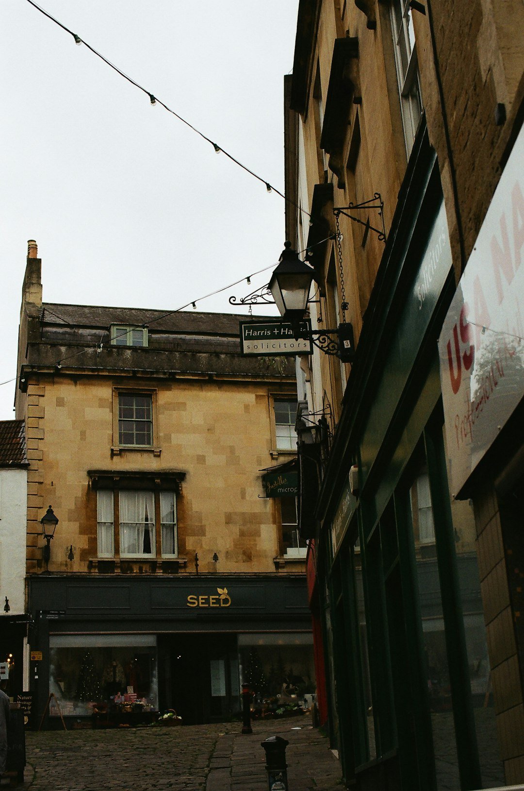 old-buildings-line-a-cobblestone-street-with-shops-rikmoebkhyi